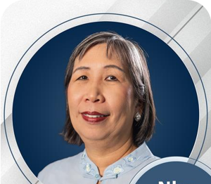 Portrait of Nhu with warm expression.