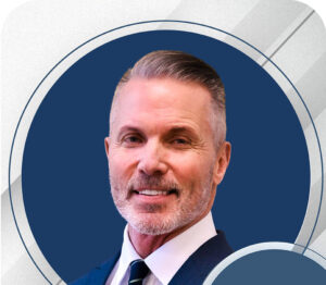 Jeff Thorud J.D., smiling in business suit.